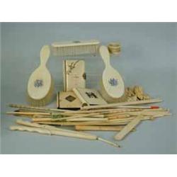 A selection of ivory and bone items