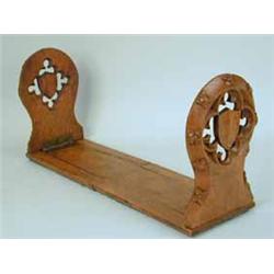 A good Victorian oak bookslide with carved and pierced ends Est.200/30