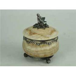A small Estonian alabaster lidded pot with silver coloured finial and embellishments