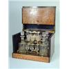 Image 1 : A l9th Century French stained oak cased liqueur set with four decanters
