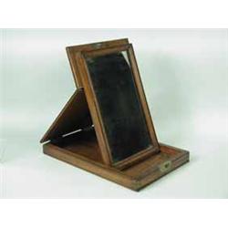 A 19th century mahogany travelling mirror