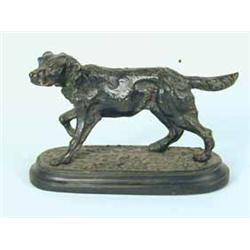A bronze figure of a pointer on an oval base