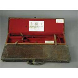Two leather gun cases