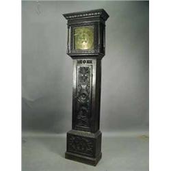 A George III carved oak longcase clock