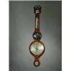 Image 1 : A George III inlaid mahogany wheel barometer