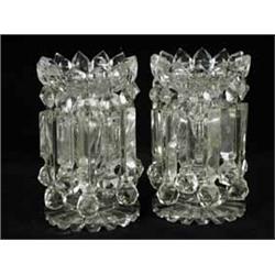 A good pair of clear glass table lustres with cut glass bodies and prismatic drops