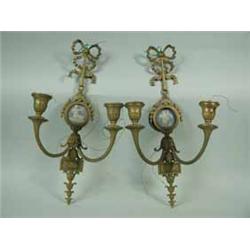 A pair of gilt twin branch wall lights with mounted Wedgwood jasperware plaques