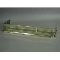 An Edwardian pierced brass fender Est.70/10