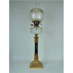 A 19th century brass oil lamp