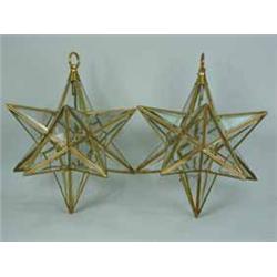A pair of brass mounted and bevelled glass 'star' lanterns