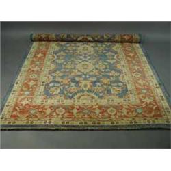 A modern blue ground handmade woollen Chechen carpet 2.53 x 1.80cm Est.400/50
