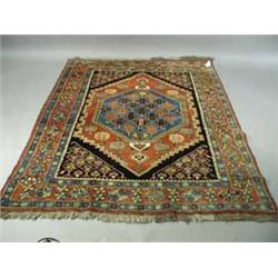 A modern rust ground hand made woollen Chechen carpet. 2.02 x 1.72cm Est.300/40