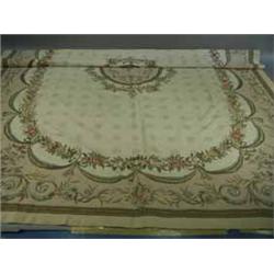 A modern beige ground hand made woollen Aubusson needlepoint carpet. 3.05 x 2.44m Est.400/50