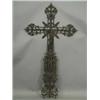 Image 1 : A cast iron crucifix with pierced figures and decoration including Christ on the cross