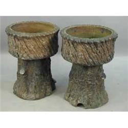 A pair of Victorian/Edwardian stoneware planters and stands