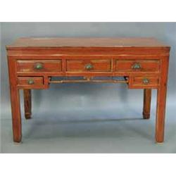 A Chinese side table with three frieze drawers and two below over a pierced apron and shaped legs