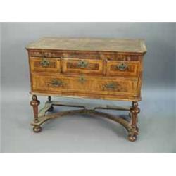 An early 18th Century style walnut lowboy