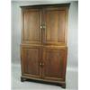 Image 1 : A 19th Century oak cupboard having four fielded panelled doors enclosing adjustable shelves