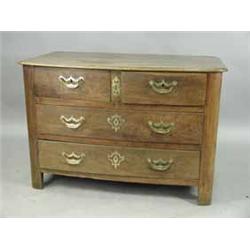 A 19th Century Continental oak bow fronted commode