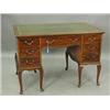 Image 1 : An Edwardian mahogany writing desk by Holland & Sons