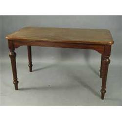 A late 19th Century Continental mahogany centre table on turned legs