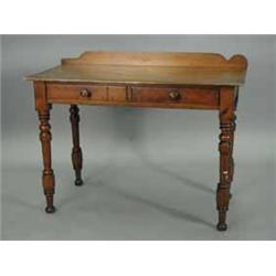 A Victorian stained pine side table with two frieze drawers on turned legs