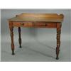 Image 1 : A Victorian stained pine side table with two frieze drawers on turned legs