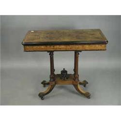 A Victorian walnut and burr walnut foldover card table with strung and crossbanded decoration