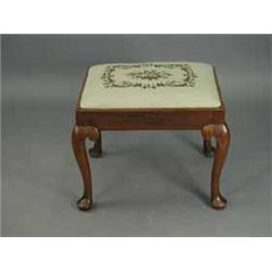 A George III mahogany stool with a drop in seat and pad foot legs Est.600/80