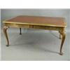 Image 1 : A walnut library table with a leather inset