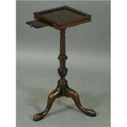 A mahogany kettle stand