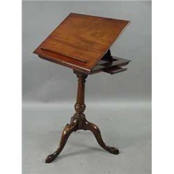 A modern mahogany reading table