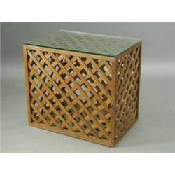 An oak box trellis coffee table with a glass top