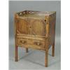 Image 1 : A George III mahogany tray top commode with a pierced gallery
