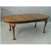 Image 1 : A 1930's walnut dining table