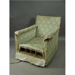 An Edwardian arm chair by Howard and Sons Ltd. Est.80/15