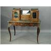 Image 1 : A Victorian chequer strung walnut bonheur du jour of serpentine shape with gilt bronze mounts