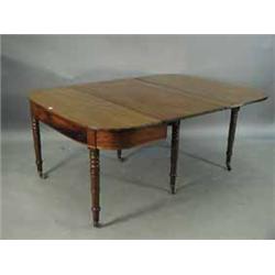 A George III strung mahogany dining table