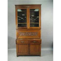 A late Victorian walnut secretaire bookcase. 106cm wide Est.300/60