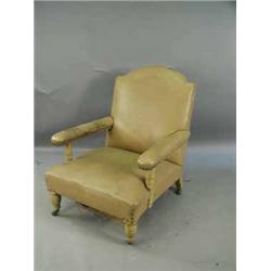 A late Victorian Howard style arm chair upholstered in leatherette on a painted grained frame Est.15