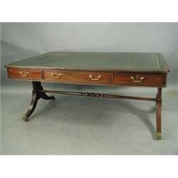 A George III style mahogany partners library table
