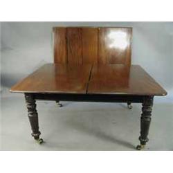 A large Victorian mahogany dining table