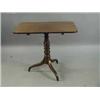Image 1 : A Victorian mahogany tripod table with a rectangular snap top