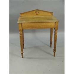 A small Victorian oak hall table with a single frieze drawer on turned legs