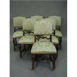 A set of six 19th century French carved walnut dining chairs