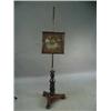 Image 1 : A Victorian mahogany pole screen with an adjustable framed embroidered screen