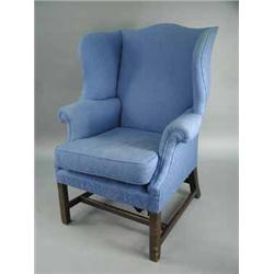 A George III style wing armchair