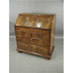 A Queen Anne period black walnut bureau