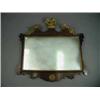 Image 1 : A mahogany wall mirror with gilt mounts