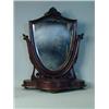 Image 1 : A Victorian mahogany toilet mirror with a shield shaped mirror on a serpentine base